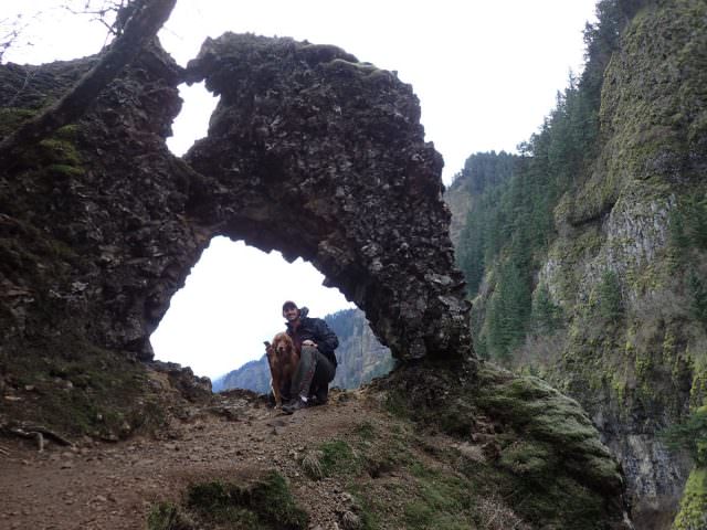 man and dog at the rock of ages