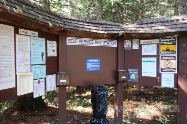 a sign on a wooden structure