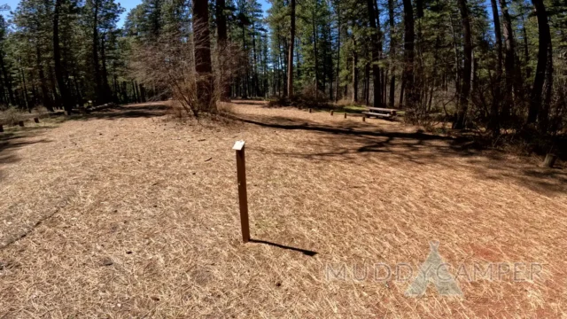 a field with a sign in it