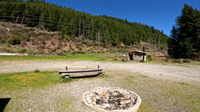 Fox Creek Group Campground with fireplace, bench and vault toilets